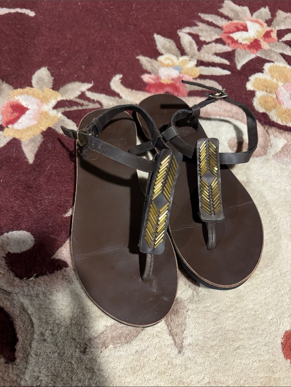 Classic Brown Leather T-Strap Sandals with Gold Chevron Detail
